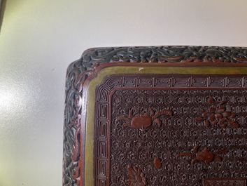 A pair of Chinese black and red cinnabar lacquer square dishes, Qianlong mark and of the period